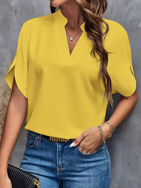 Blouse à col en V de couleur unie