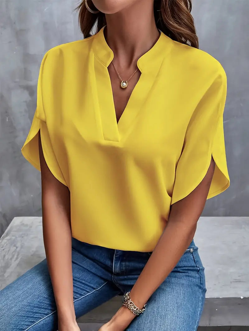 Blouse à col en V de couleur unie